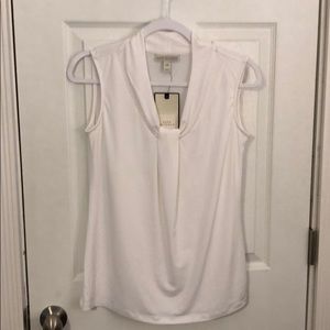White sleeveless top
